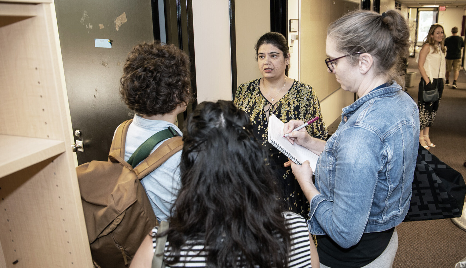 Priti Bhatia, Ivan Allen College director of faciltiies and capital planning, discusses plans for the School of Public Policy's tempoorary relocation during a visit to the Rich Computing Building.