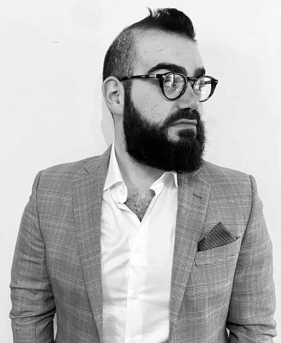 Black and white headshot of Juan Andrés.